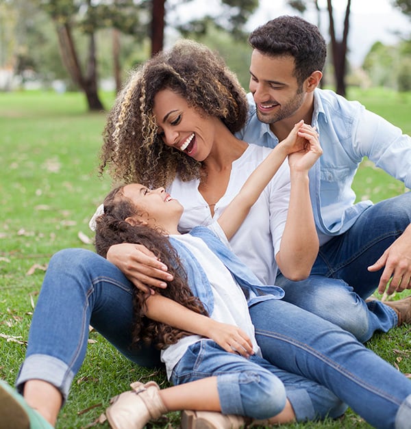 Happy parents and child